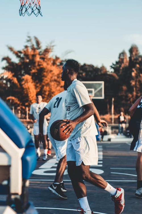 Free Men Playing Basketball Stock Photo