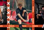 Atleta in allenamento con abbigliamento sportivo