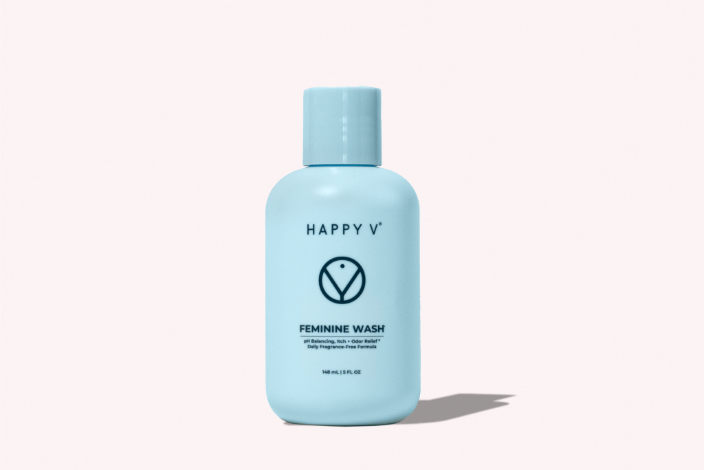Happy V Feminine Wash bottle on a gray background