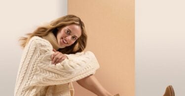 Aetrex tan wedge boot styled in a lifestyle setting