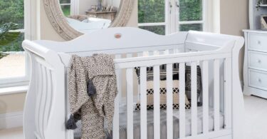 Sleigh Royale cot bed styled in a nursery room