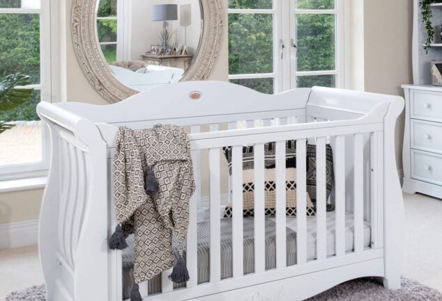 Sleigh Royale cot bed styled in a nursery room