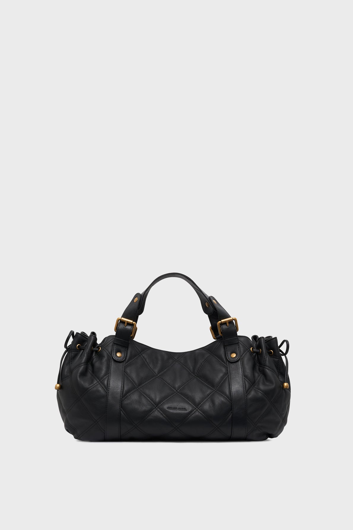 Sac Gerard Darel 24H en cuir matelassé noir sur fond clair