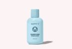 Happy V Feminine Wash bottle on a gray background