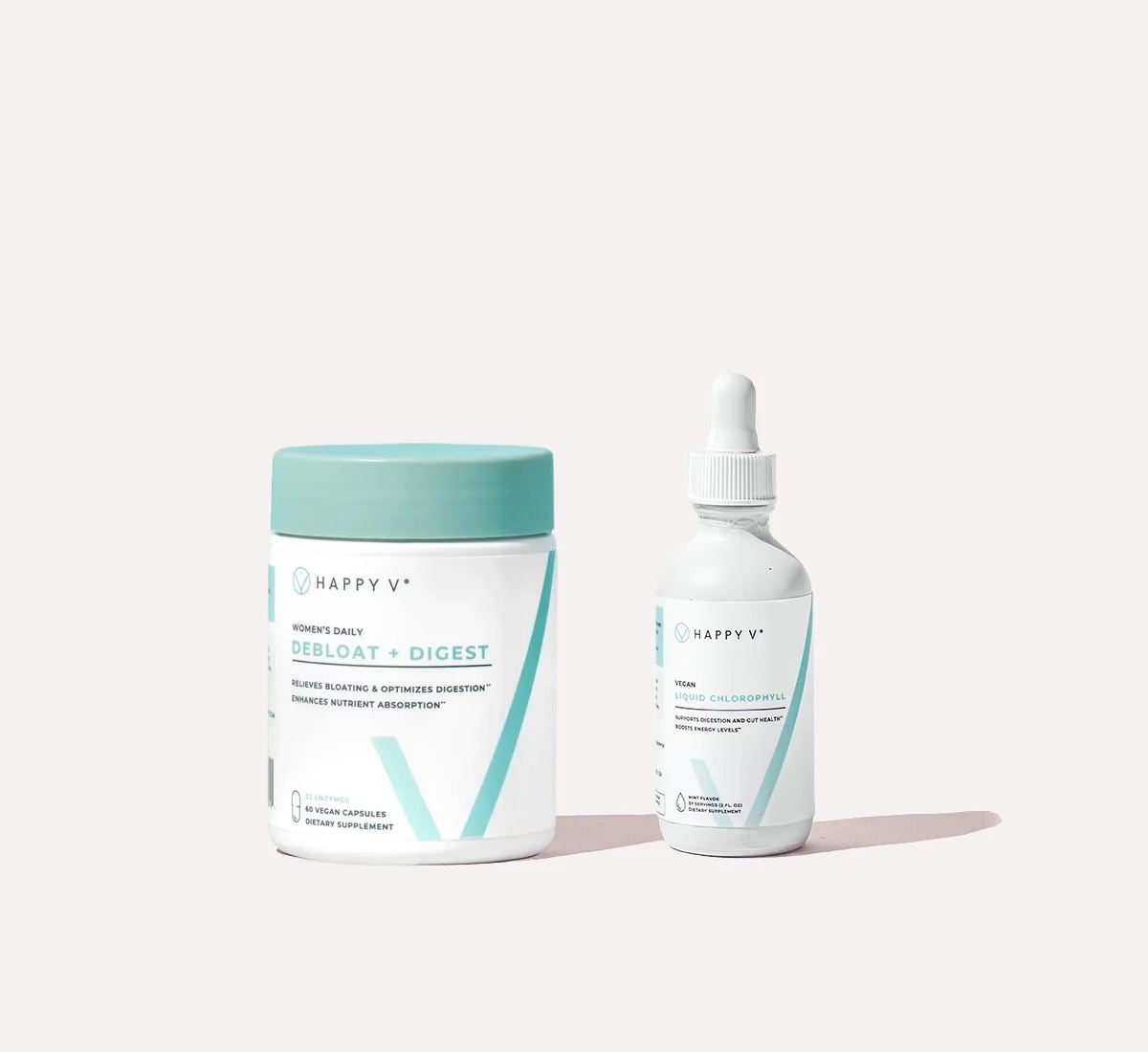 Happy V debloat and liquid chlorophyll products arranged together