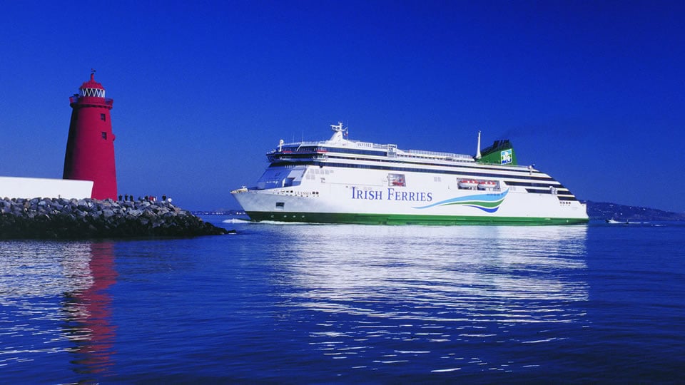 Ulysses ferry near a lighthouse