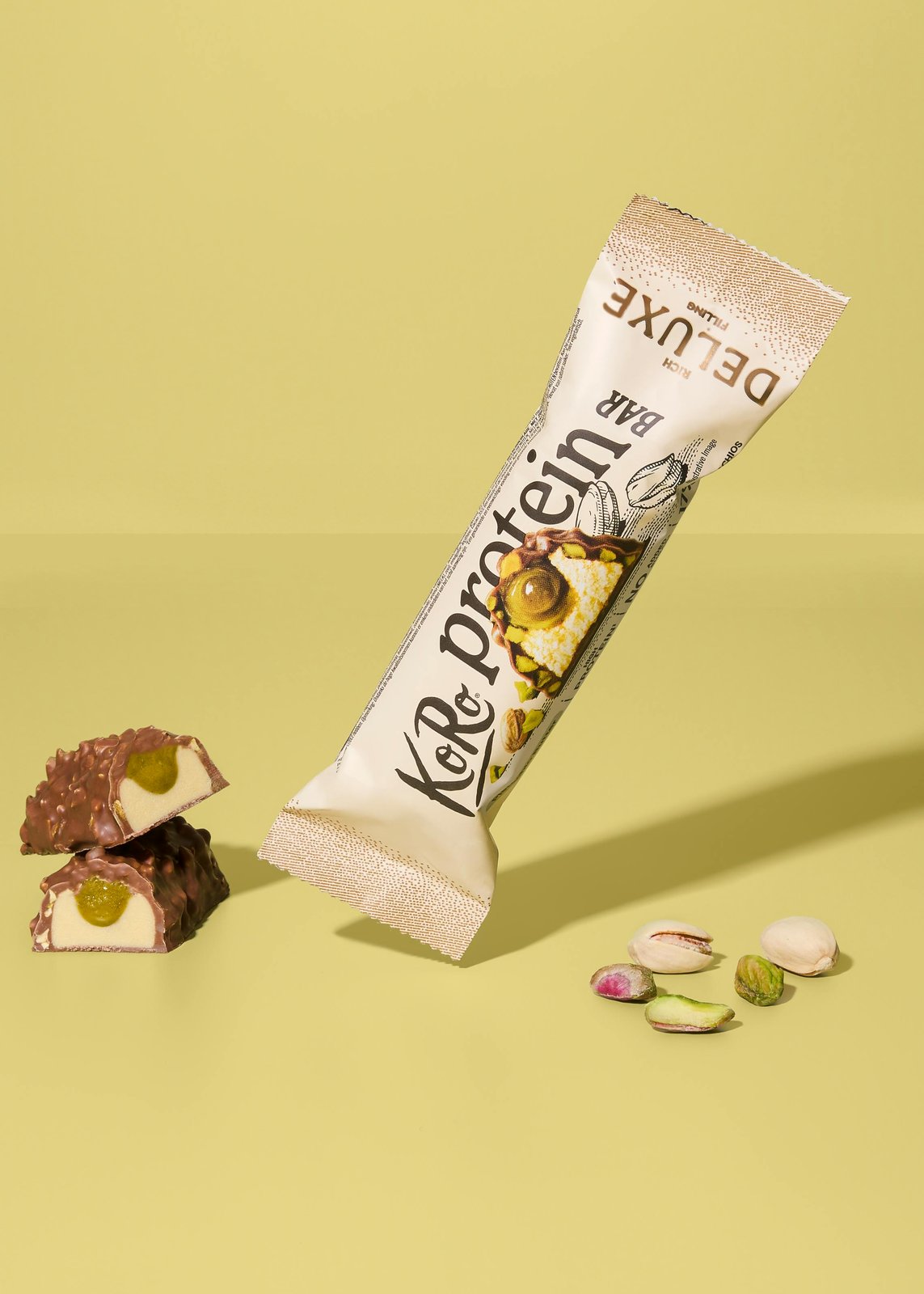Proteinriegel mit Pistazienfüllung und Schokoladenüberzug