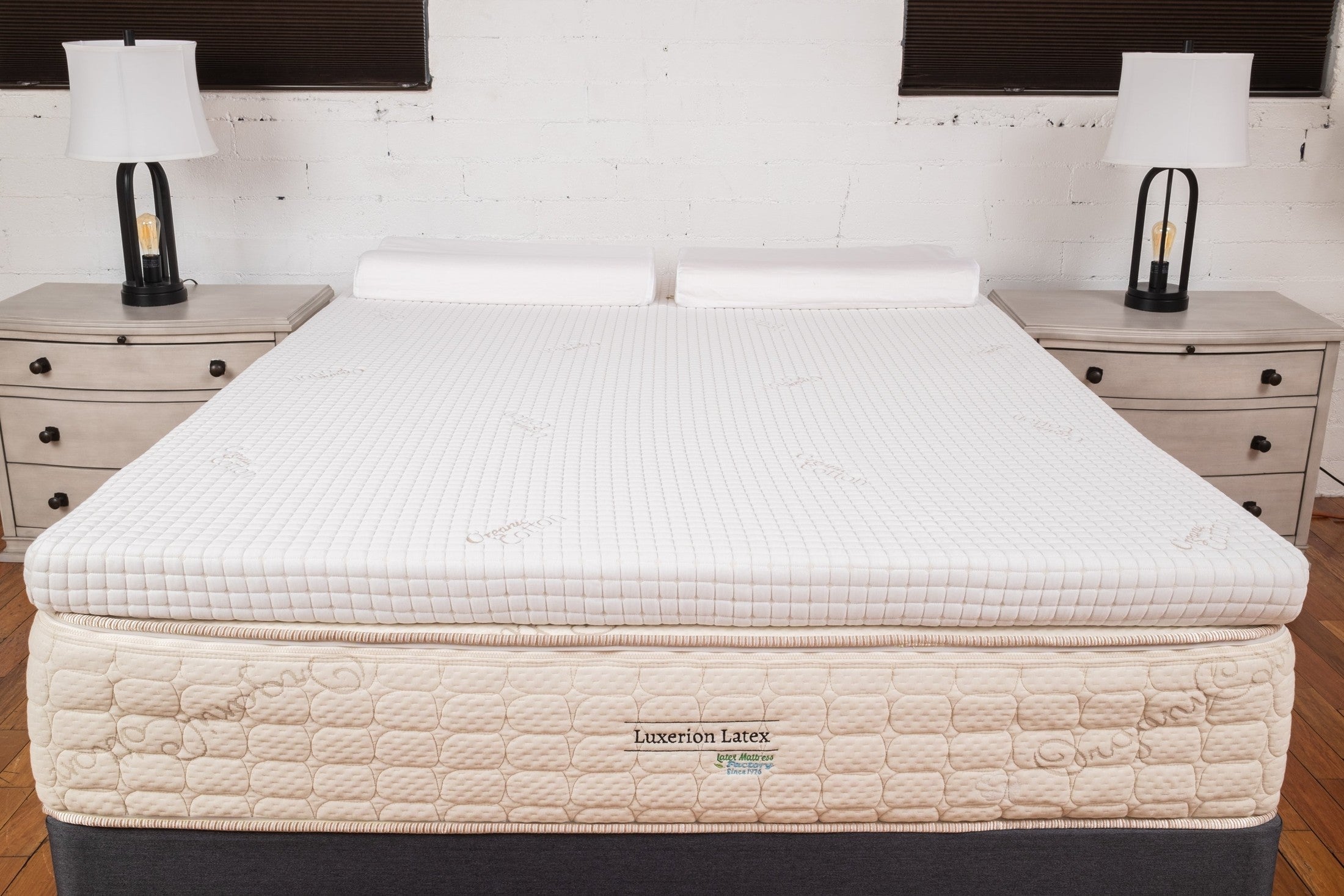 Talalay latex mattress topper shown on a bed