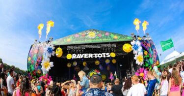 People enjoying the outdoor Raver Tots event