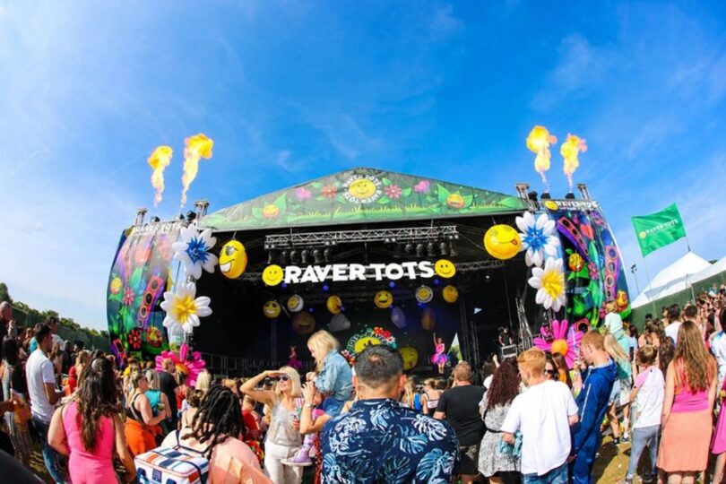 People enjoying the outdoor Raver Tots event