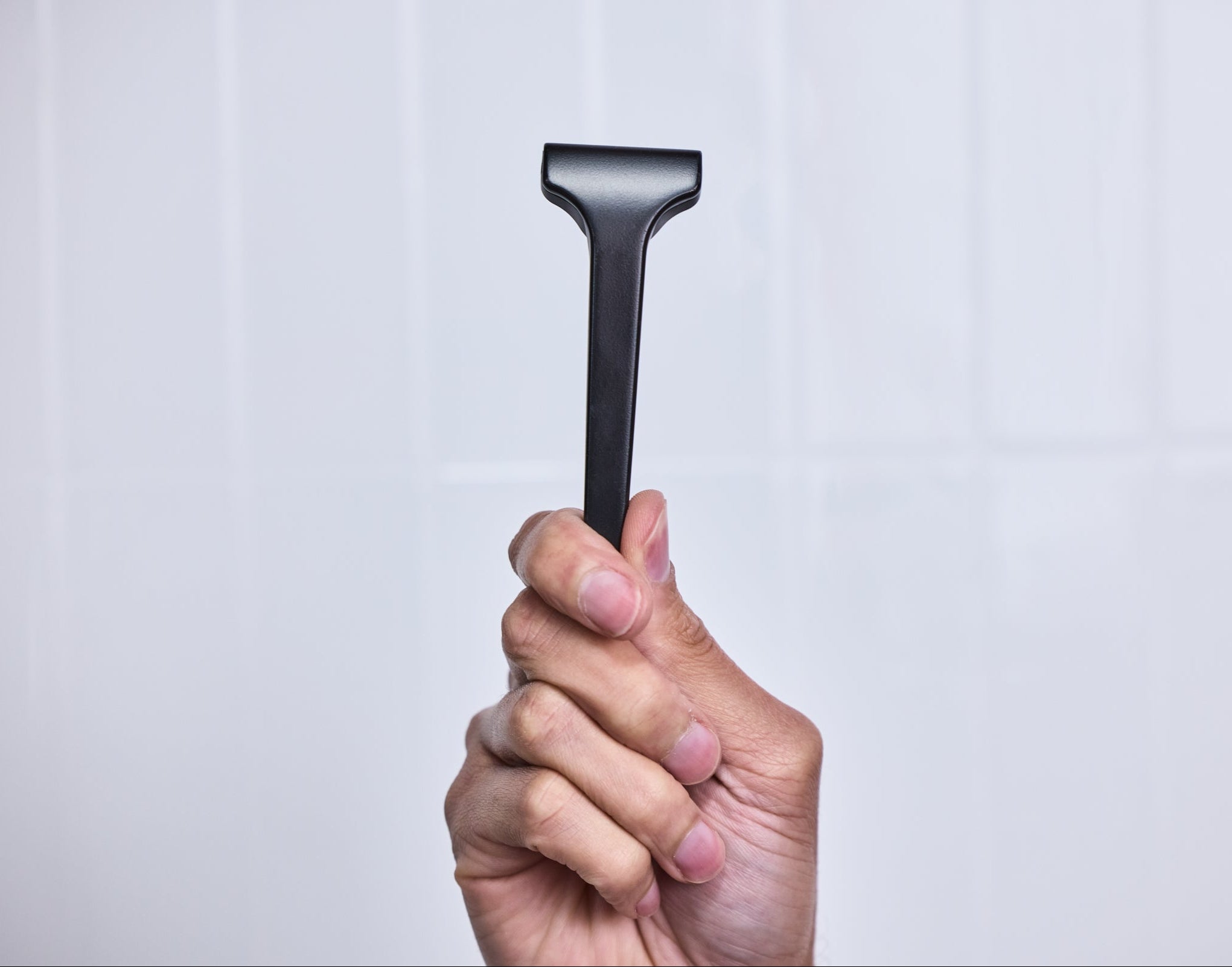 Hand holding a Supply trimmer