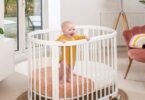 Boori Oasis Oval Cot in a nursery room