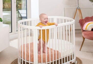 Boori Oasis Oval Cot in a nursery room