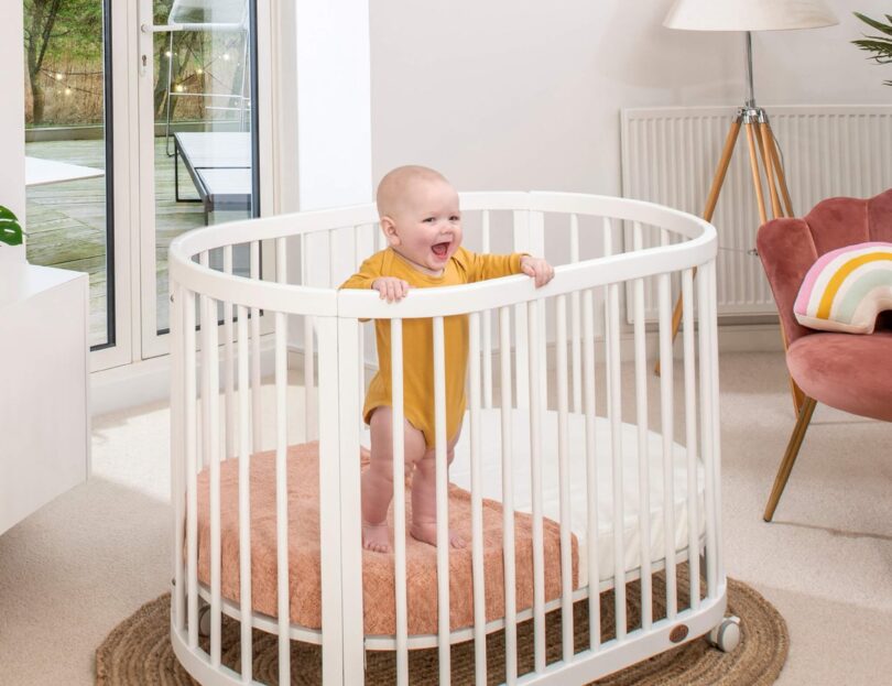 Boori Oasis Oval Cot in a nursery room