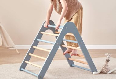 Child climbing a Boori Tidy Climbing Triangle in a playroom