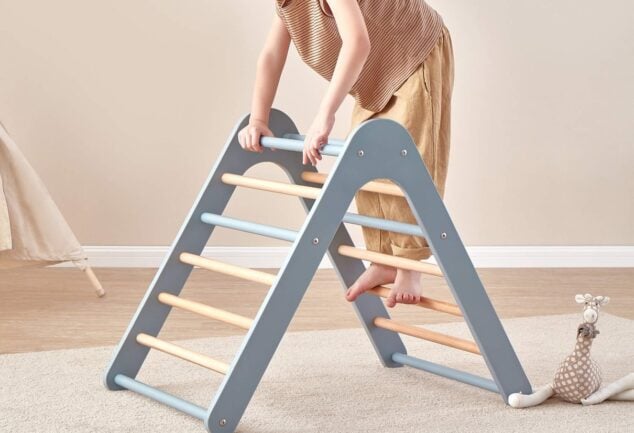 Child climbing a Boori Tidy Climbing Triangle in a playroom