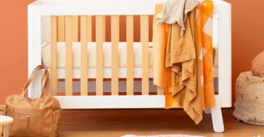 Turin cot bed styled in a nursery