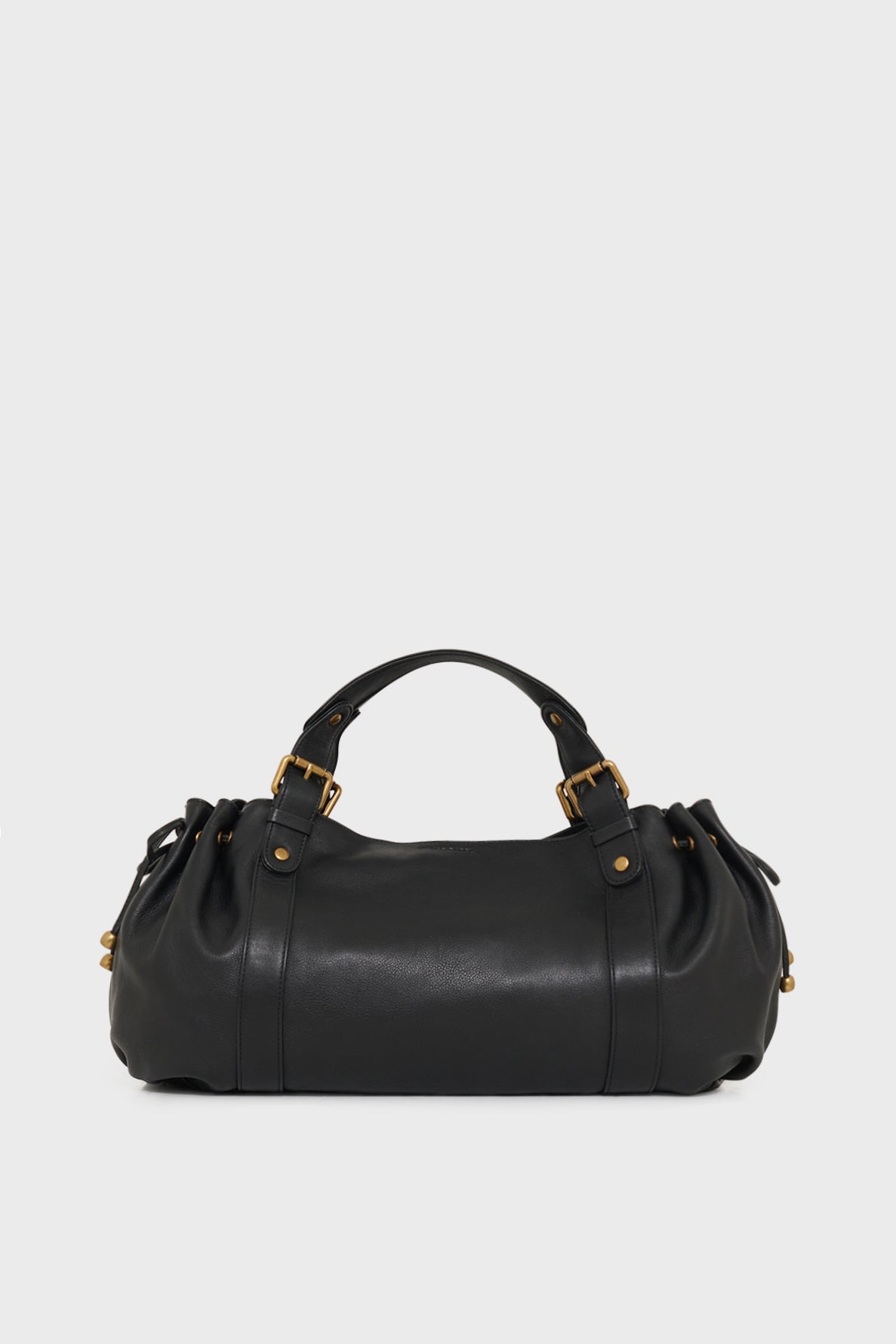 Sac à main Gerard Darel 24H en cuir noir sur fond gris clair