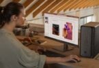 HP OmniDesk desktop shown in a home workspace scene