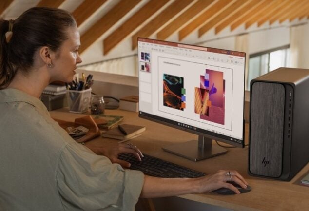 HP OmniDesk desktop shown in a home workspace scene