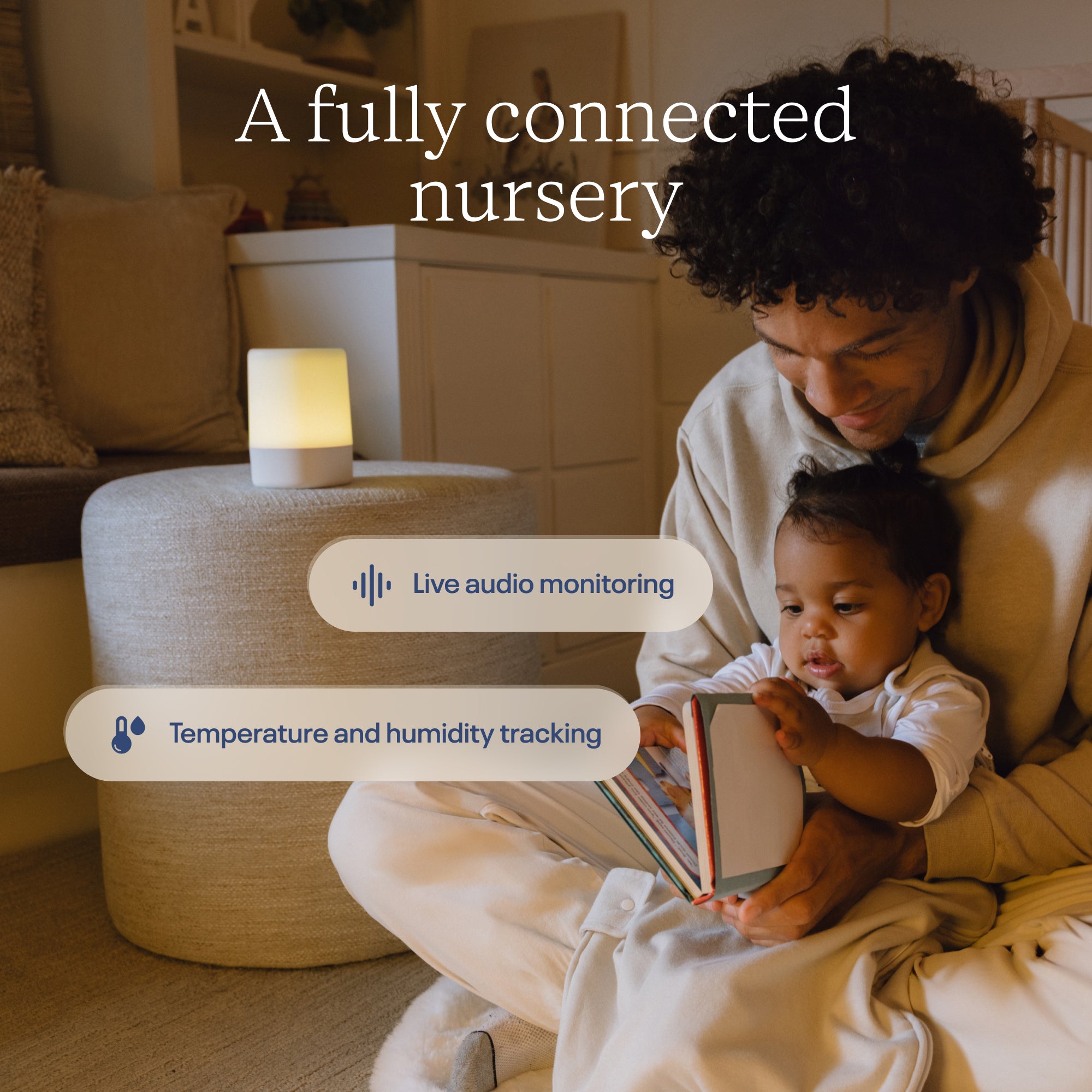 Nanit Sound + Light Machine in a nursery beside a baby