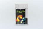 ST Dupont lighter featuring a penguin graphic