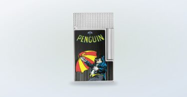 ST Dupont lighter featuring a penguin graphic